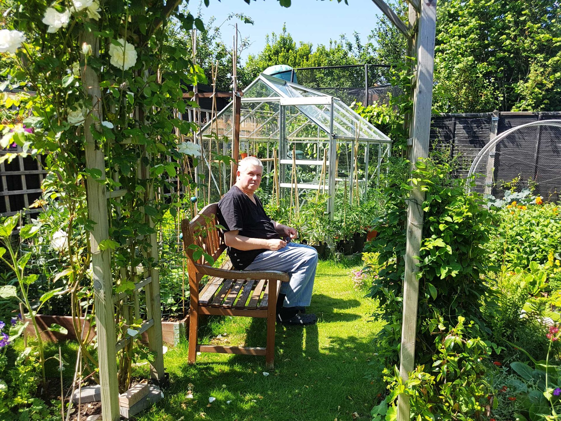 Andrzej rests in the garden